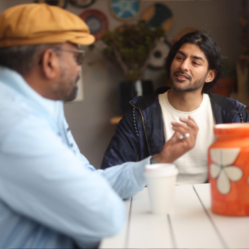 A support worker and participant during a home visit