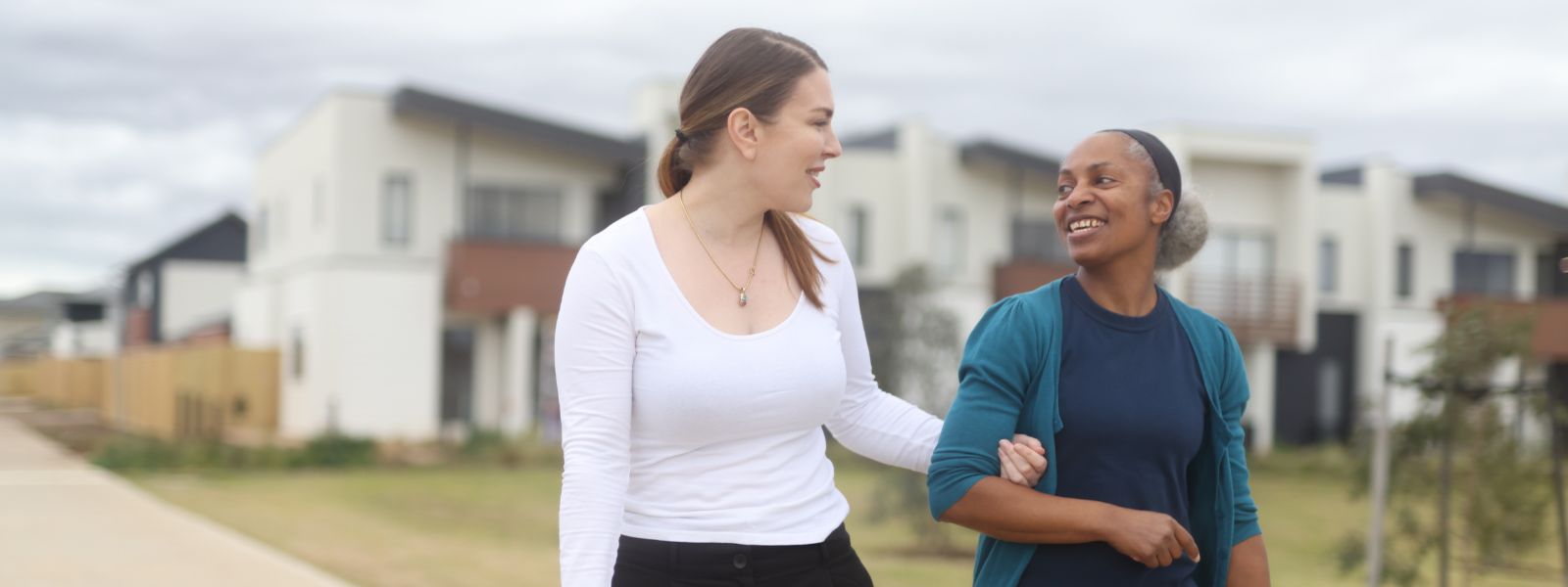 A support worker talking with a participant in Fairfield